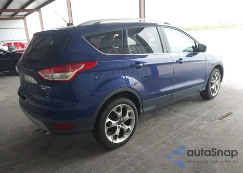 2014 Ford Escape Titanium z USA, uszkodzony, nr VIN 1FMCU9JX0EUD22859